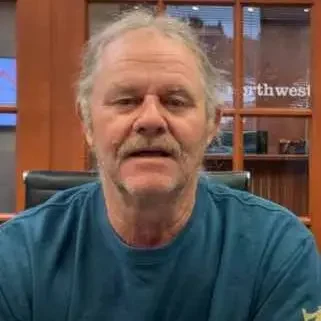 Real Columbus Homeowner: Fast Cash Home Sale Success Story Smiling older man sharing his positive experience with Columbus cash home buyers