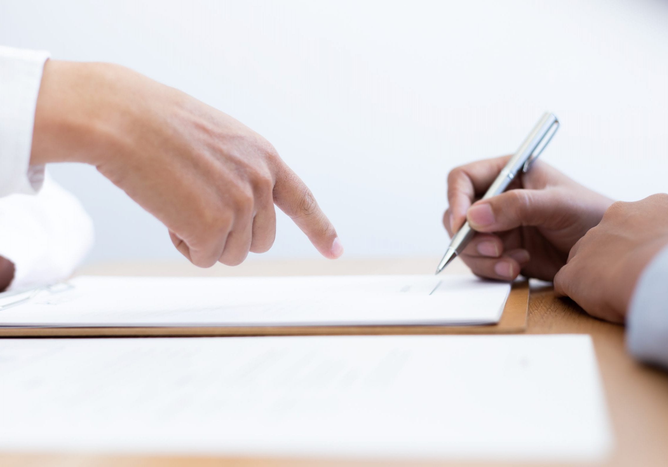 Business people negotiate for customers to sign land sales contracts, Property purchase contract of concept